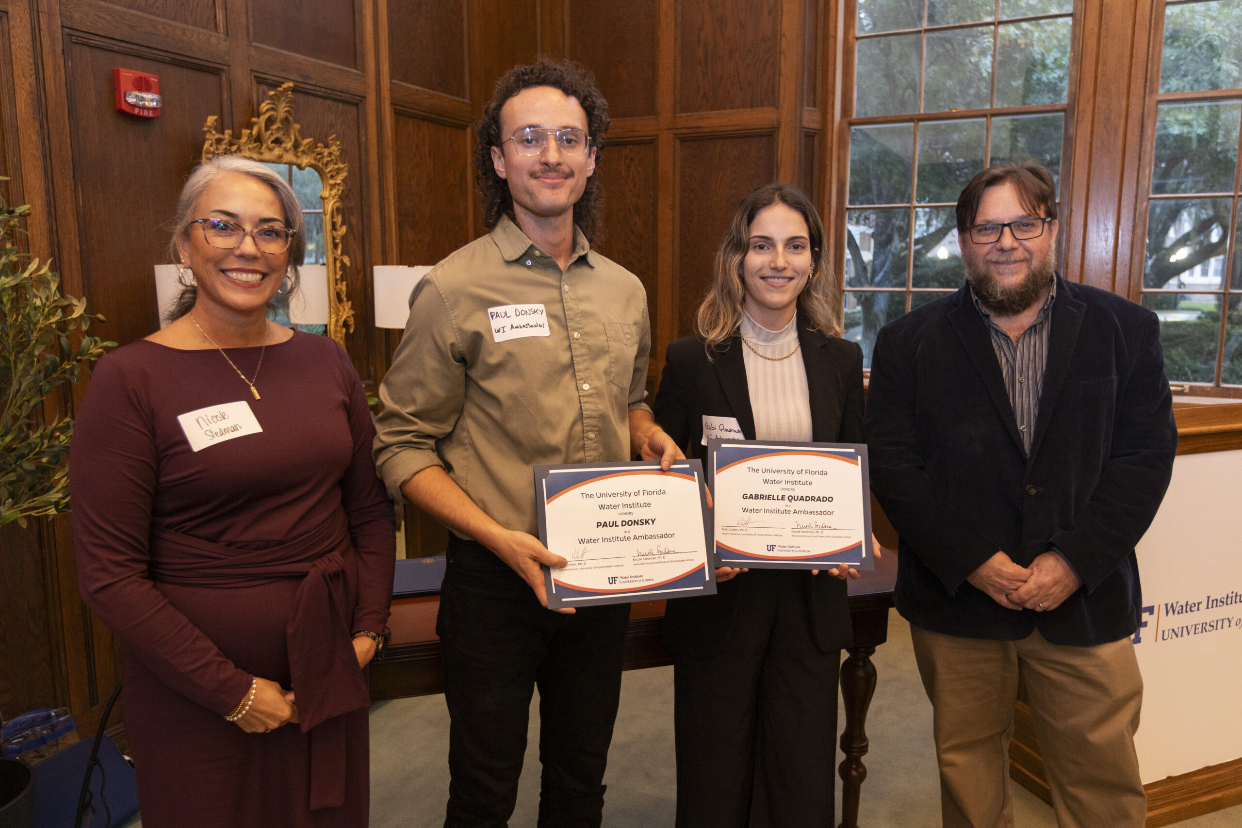 Paul Donsky and Gabrielle Quadrado being presented with Water Institute Ambassador recognition