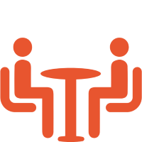 Icon two people seated across from each other at the table.