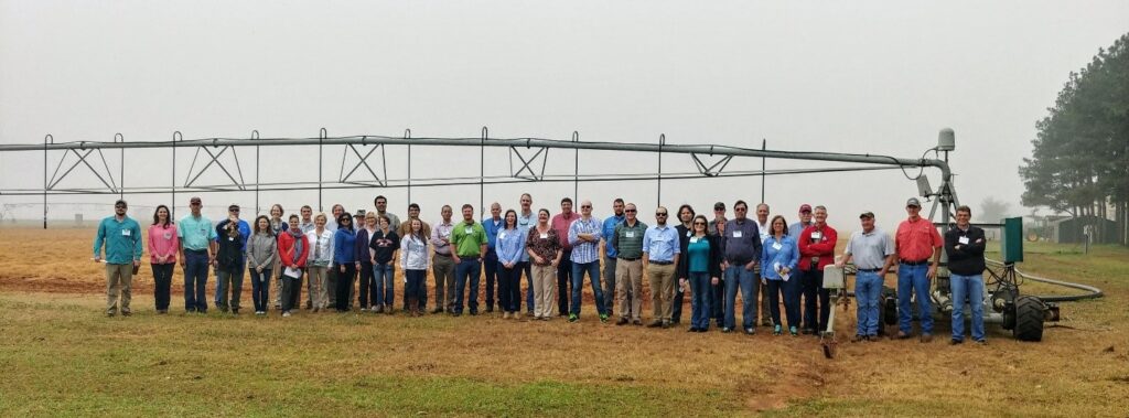 A group photo of the FACETS team at a field site.