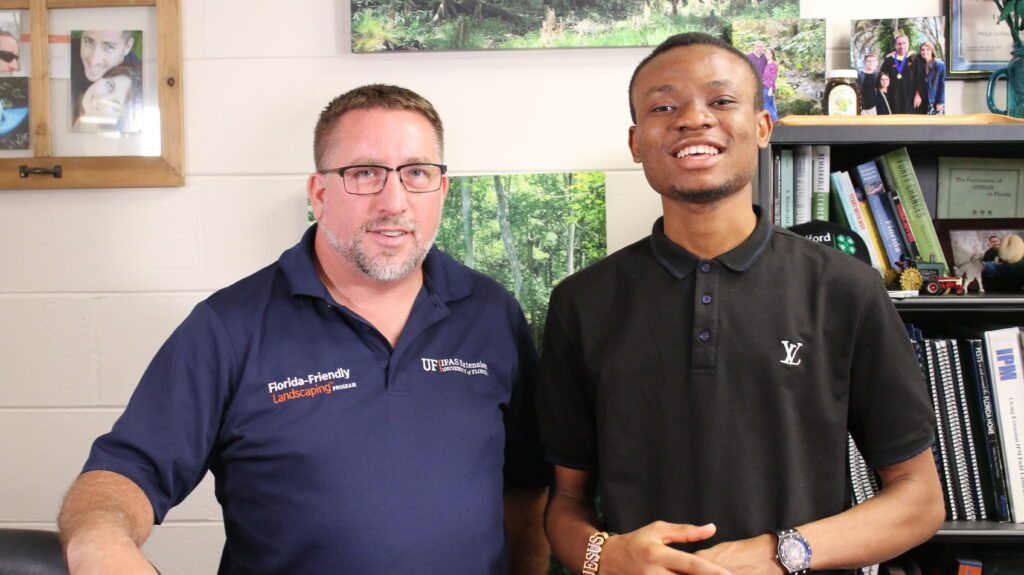 Ayodele with Luke Harlow, the UF/IFAS Bradford County Horticulture and Small Farms Extension Agent.