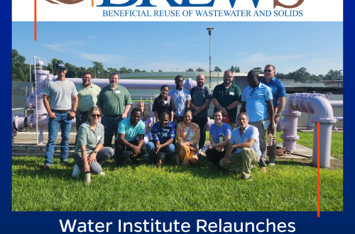 Members of the BREWS Water Scholars program in front of a water reclamation facility.