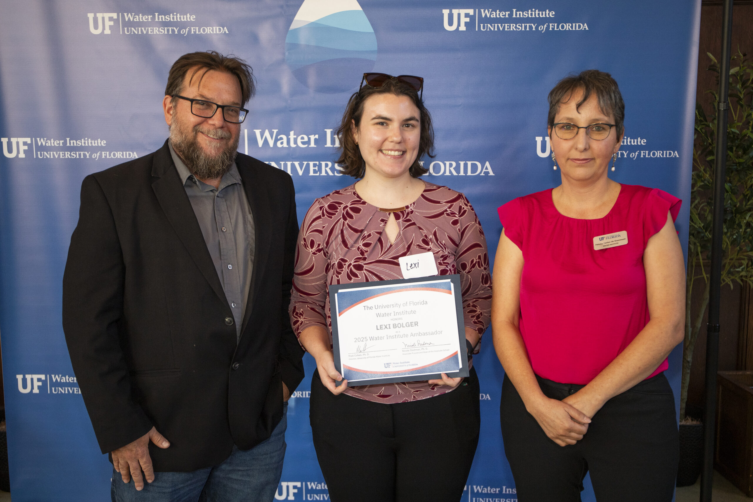 Graduate students being presented with their Travel Awards.